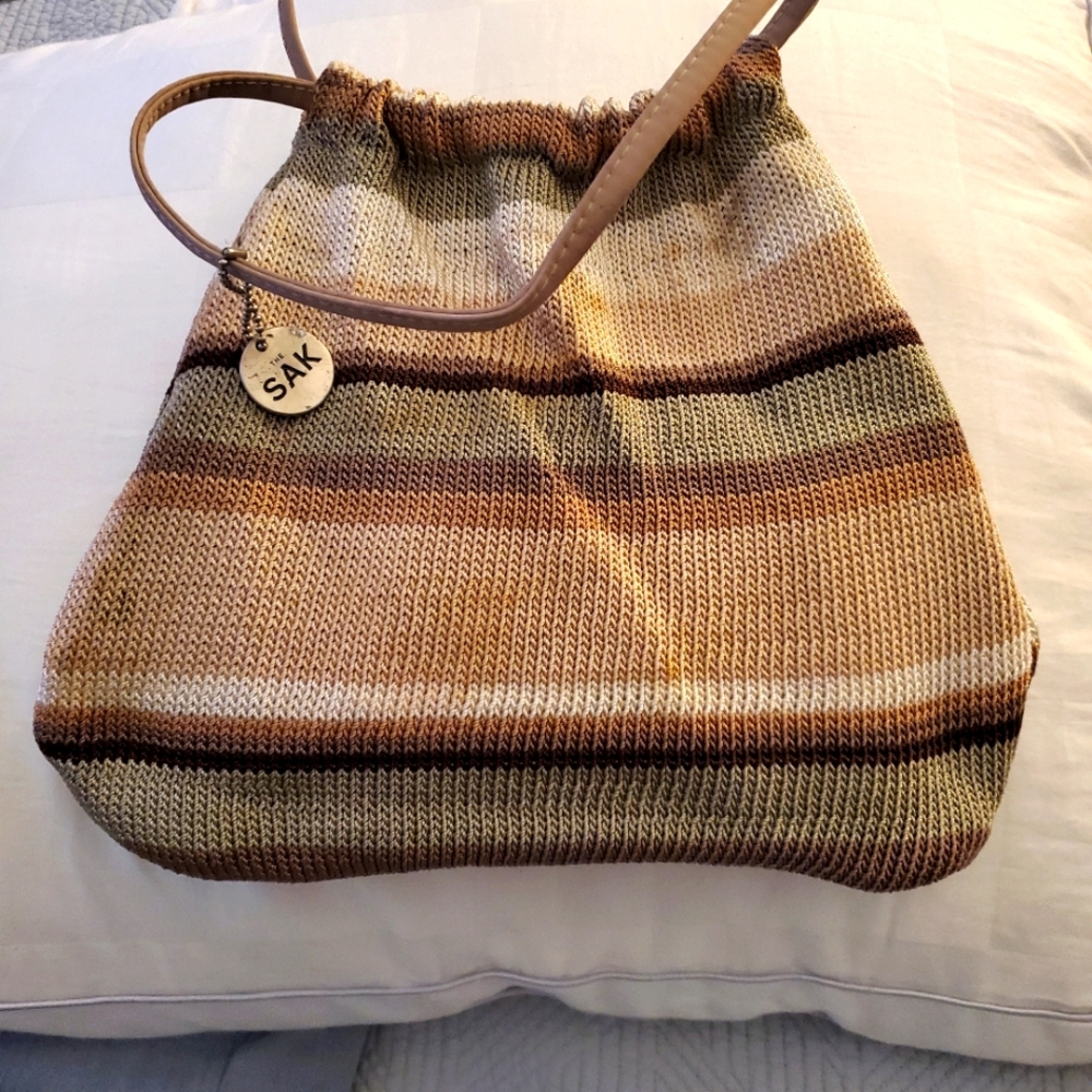 The Sak crochet and nylon mini hobo